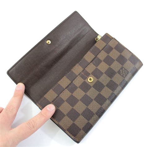 offerta portafoglio donna stampato louis vuitton nero lucido stampato|louis vuitton portafogli.